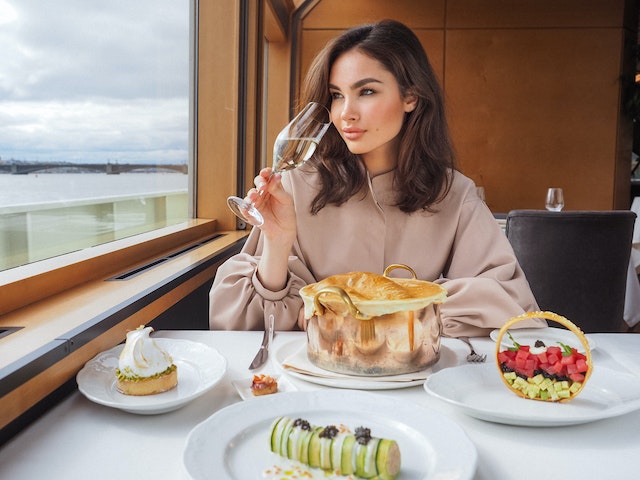 Woman Eating a Meal on a Cruise