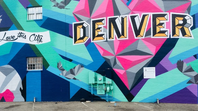graffiti wall with colorful blocks and text "Denver"