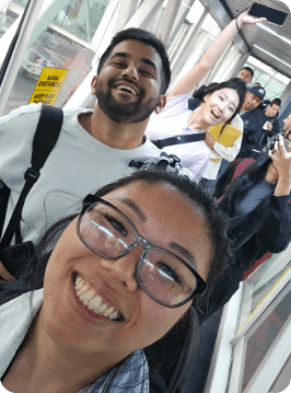 group selfie in an airport terminal